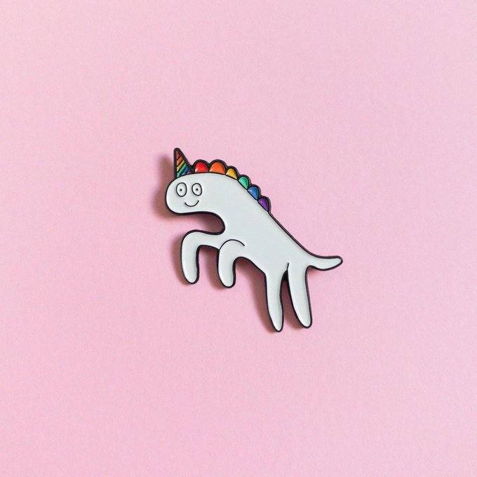 Photo of a Unicorn pin with a rainbow coloured mane
