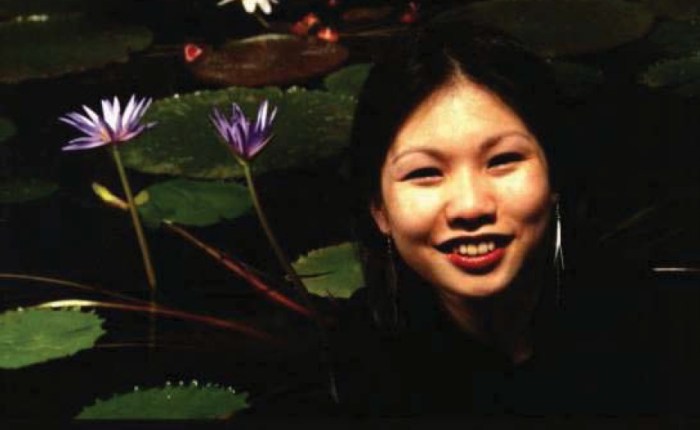 Me, in front of some flowers on a lake