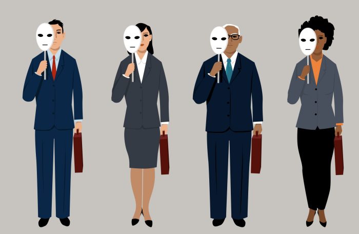 Four figures holding up white masks in business suits