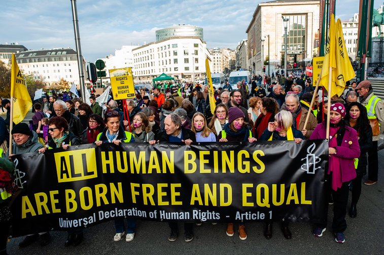 Photo of a protest run by Amnesty International