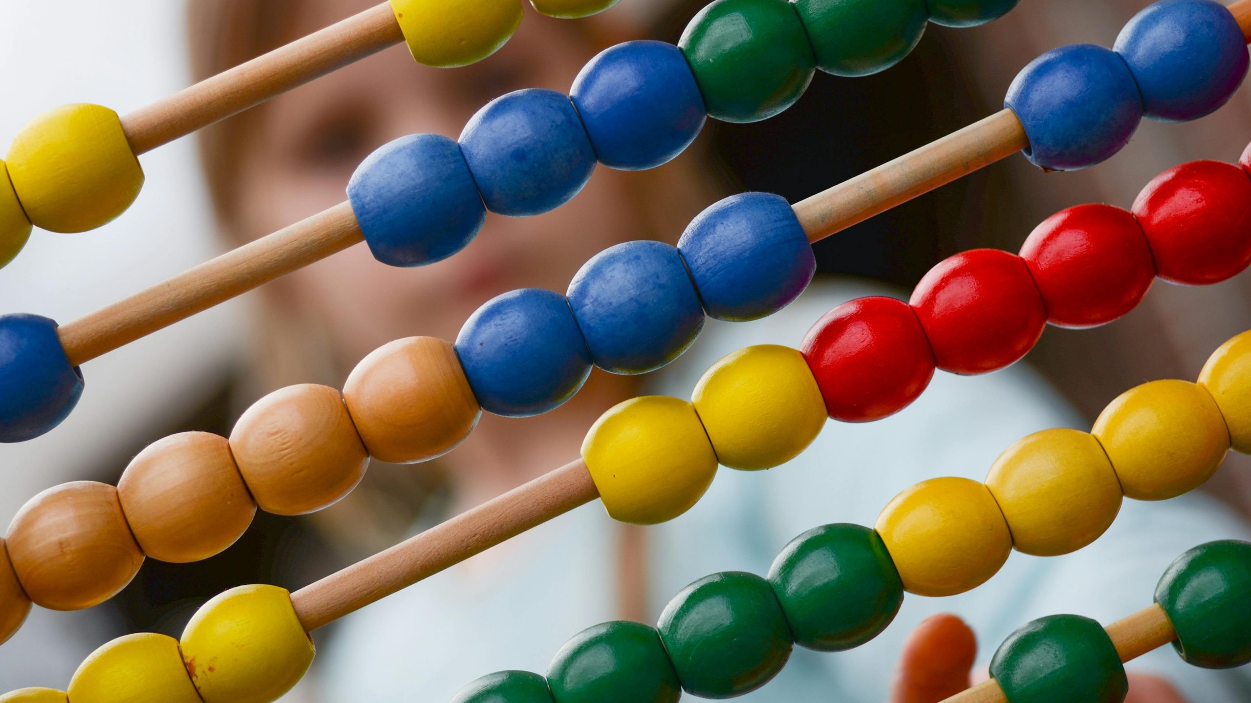 Largely decorative image of an abacus