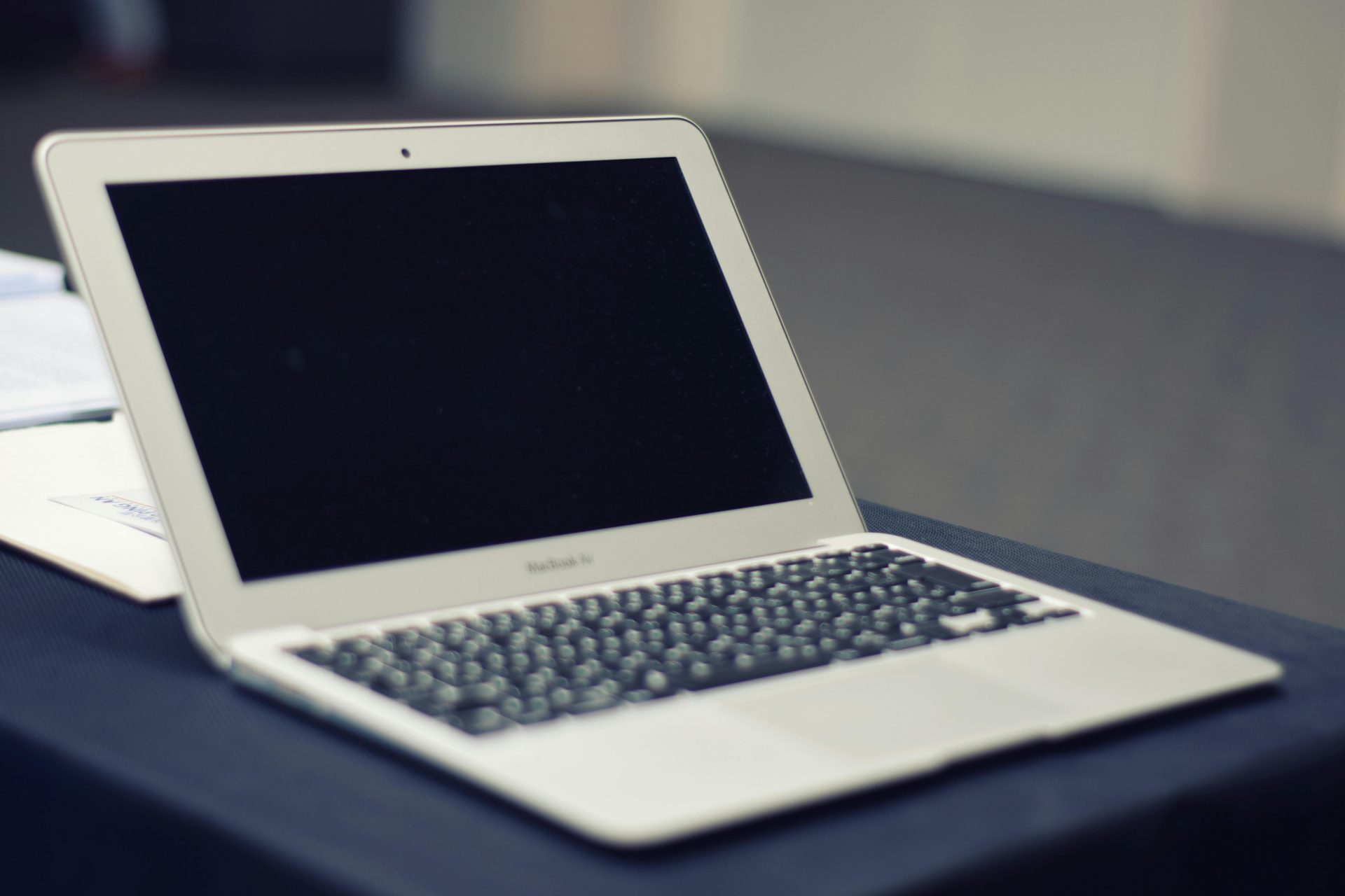 Largely decorative image of a laptop on a desk