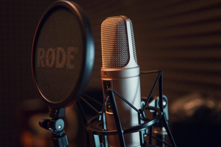 Largely decorative image of a microphone