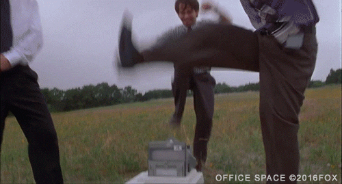 Gif of three men stomping on a printer. It is a short clip from the movie Office Space, (c) 2016 Fox